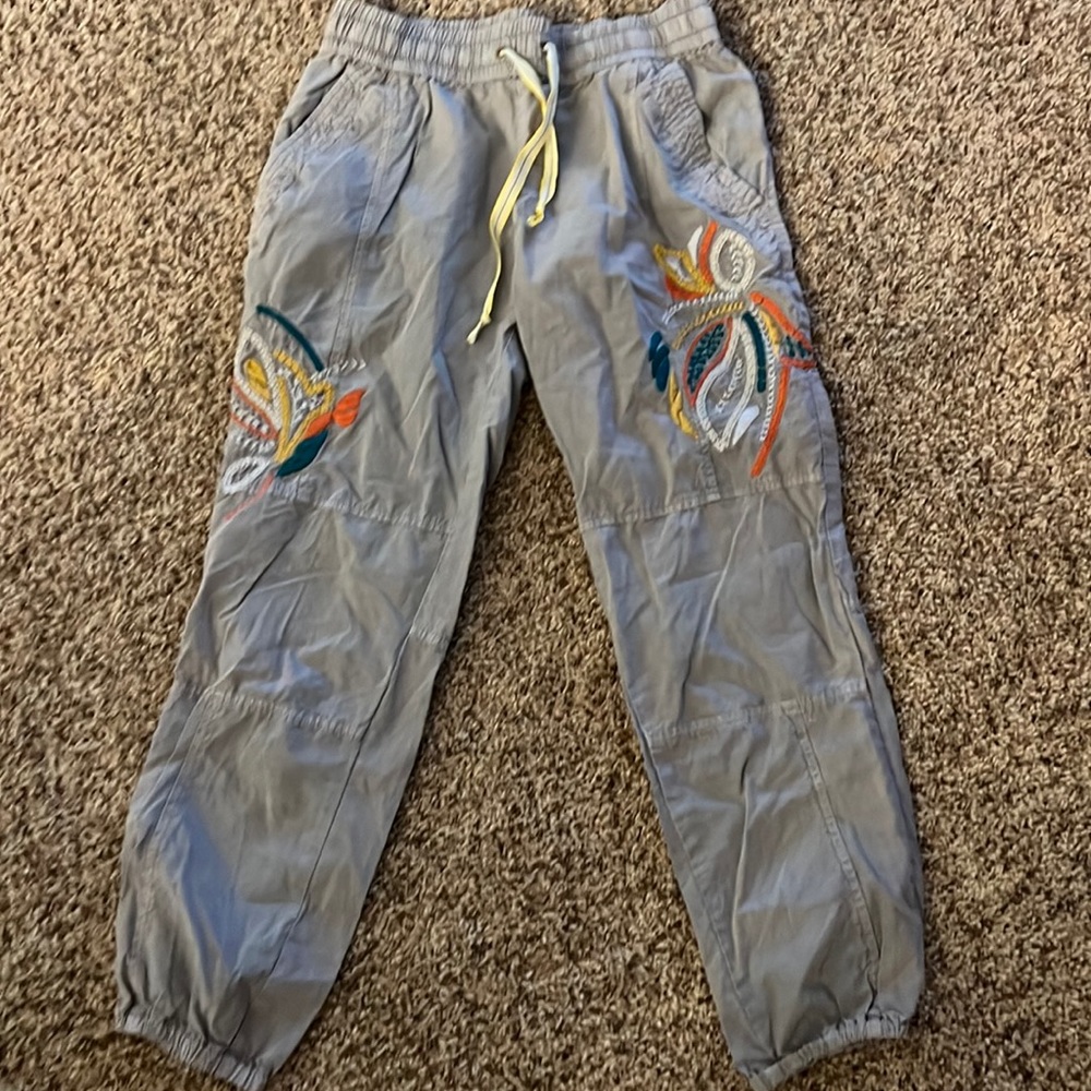 Anthropologie elastic waist pants size XS with embroidery on front